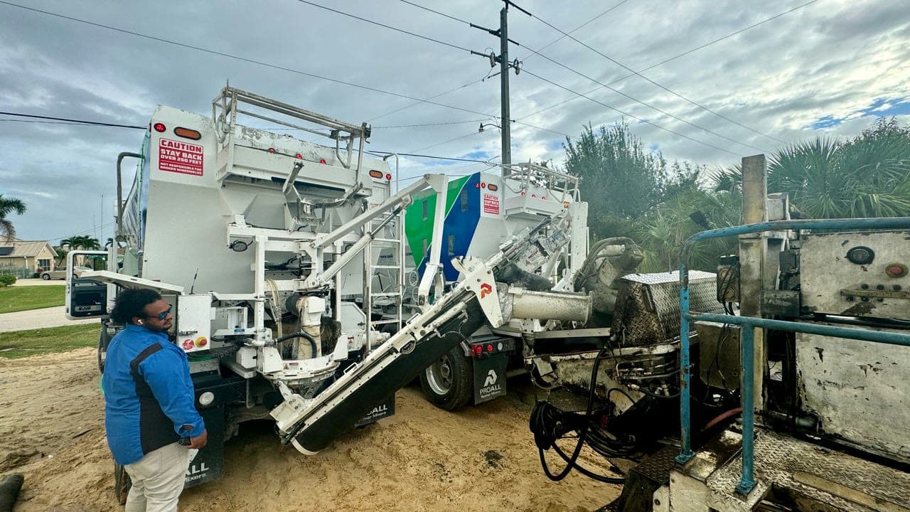 Quality-Crete crew and mixer on a customer jobsite