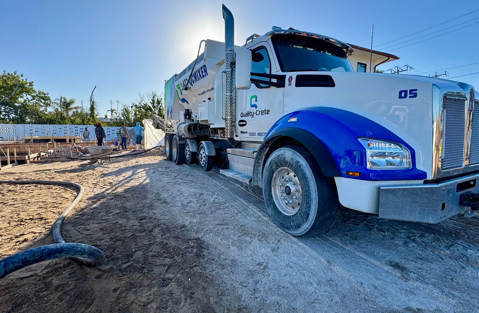 Quality-Crete volumetric mixer truck on a shotcrete job site