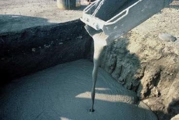 Flowable fill poured into a utility trench