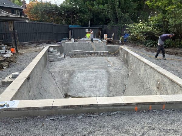 Crew forming a new pool shell