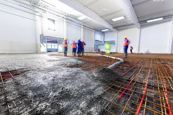 Rebar grid laid out inside a commercial slab pour